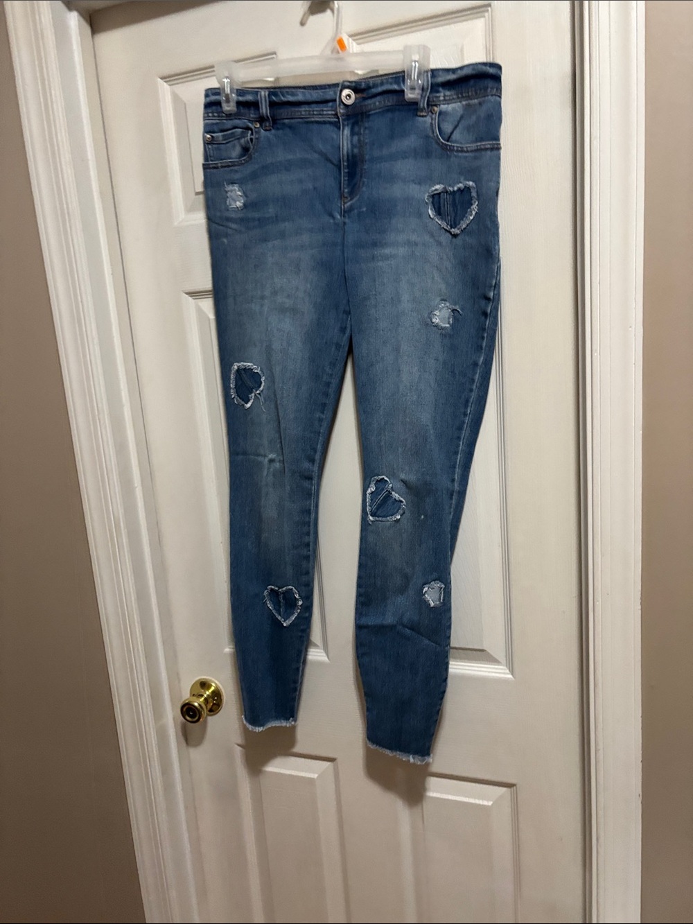 INC International Concepts Distressed Blue Skinny Jeans with Heart Cutouts